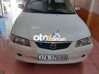 Cần bán xe Mazda 626 2002 - Bán Mazda 626 năm sản xuất 2002, màu trắng giá cạnh tranh