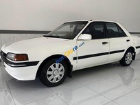 Mazda 323 1995 - Cần bán gấp Mazda 323 đời 1995, màu trắng