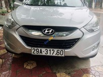 Hyundai Tucson   2.0 AT 4WD   2011 - Bán Hyundai Tucson 2.0 AT 4WD đời 2011, màu bạc, xe nhập  