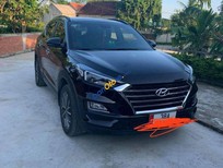 Hyundai Tucson   2021 - Cần bán Hyundai Tucson 2021, màu đen còn mới 