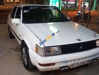 Toyota Corolla 1986 - Cần bán Toyota Corolla sản xuất 1986, màu trắng, nhập khẩu, 45tr