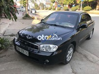 Kia Spectra 2005 - Cần bán gấp Kia Spectra 2005, màu đen giá cạnh tranh