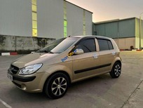 Cần bán xe Hyundai Getz   1.1 MT  2009 - Cần bán gấp Hyundai Getz 1.1 MT sản xuất năm 2009, màu vàng, nhập khẩu