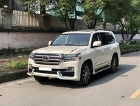 Toyota Land Cruiser 5.7 V8 2012 - Cần bán xe Toyota Land Cruiser 5.7 V8 trắng nội thất kem, năm 2012 full option