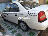 Cần bán Daewoo Nubira 2004 - Cần bán gấp Daewoo Nubira MT sản xuất 2004, màu trắng