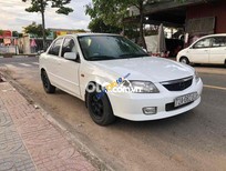 Mazda 323 2003 - Màu trắng, 115tr