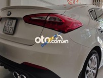 Bán xe oto Kia K3 2016 - Màu trắng, số sàn, giá cực tốt