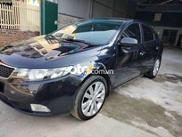 Cần bán Kia Forte 2012 - Màu đen số tự động, giá 330tr