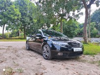 Cần bán Kia Forte 2010 - Xe màu đen, giá cực tốt