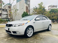 Cần bán Kia Forte 2010 - Xe màu bạc giá hữu nghị