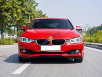 Cần bán BMW 320i 2013 - Xe màu đỏ, xe nhập số tự động
