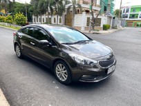 Kia K3 MT 2015 - Cần bán lại xe Kia K3 MT 2015, màu xám, 339tr