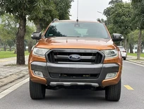 Cần bán Ford Ranger Wildtrak 3.2L 4x4AT  2016 - Cần bán Ford Ranger Wildtrak 3.2L 4x4AT năm 2016, màu cam, nhập khẩu Thái Lan 