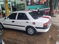 Bán Mazda 1200 Đủ 1995 - Cần bán xe Mazda 323 Đủ đời 1995, màu trắng, nhập khẩu