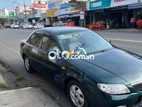 Cần bán Mazda 323   2000 - mazda 323