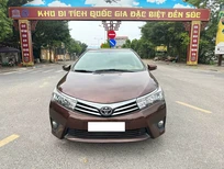 Toyota Corolla altis 1.8G MT 2014 - Cần bán Toyota Corolla altis 1.8G MT 2014, màu nâu, giá tốt