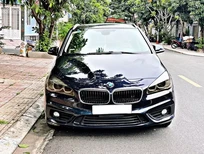 Bán xe oto BMW 218i hatchback 1.5 AT 2016 - Cần bán xe BMW 218i hatchback 1.5 AT 2016, màu xanh lam, nhập khẩu nguyên chiếc