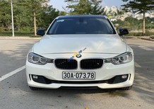 BMW 320i 2013 - Cần bán lại xe màu trắng
