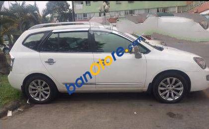 Kia Carens MT 2012 - Bán Kia Carens MT sản xuất 2012, màu trắng số sàn giá cạnh tranh