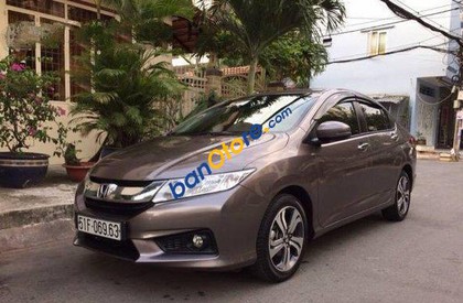 Honda City   AT 2015 - Cần bán gấp Honda City AT sản xuất năm 2015, màu nâu giá cạnh tranh