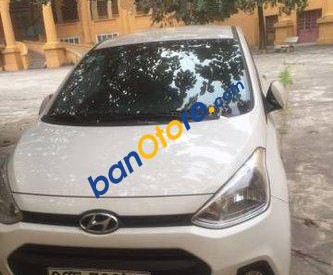 Hyundai i10   MT 2014 - Cần bán xe Hyundai i10 MT năm 2014, màu trắng