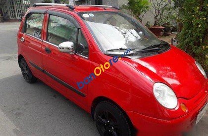 Daewoo Matiz MT 2004 - Chính chủ bán Daewoo Matiz MT đời 2004, màu đỏ, số sàn