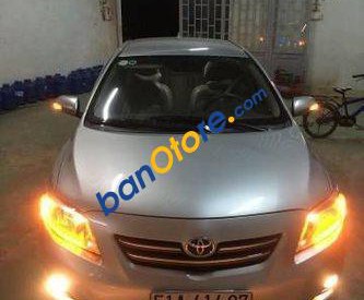 Toyota Corolla altis MT 2009 - Bán Toyota Corolla altis MT sản xuất năm 2009, màu bạc chính chủ, giá tốt