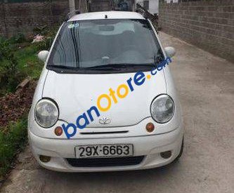 Daewoo Matiz MT 2005 - Cần bán Daewoo Matiz MT sản xuất 2005, màu trắng số sàn