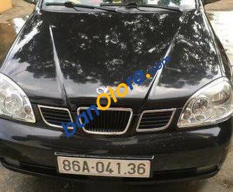 Daewoo Lacetti   MT 2004 - Cần bán lại xe Daewoo Lacetti MT sản xuất năm 2004, màu đen