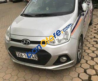 Hyundai i10  MT 2014 - Bán ô tô Hyundai i10 MT đời 2014, màu bạc