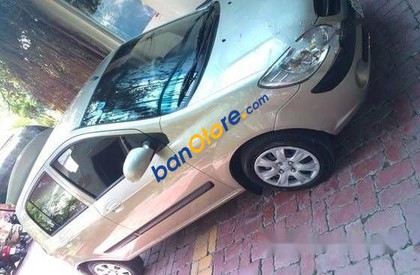 Hyundai Getz    MT 2010 - Cần bán lại xe Hyundai Getz MT năm 2010, màu vàng đã đi 45000 km