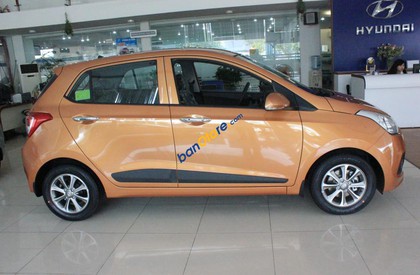 Hyundai Grand i10 2014 - Bán xe Hyundai Grand i10 sản xuất năm 2014, màu vàng, xe nhập