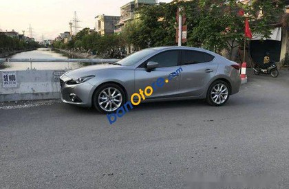 Mazda 3  AT 2015 - Cần bán Mazda 3 AT sản xuất 2015, màu xám đã đi 25000 km, 685tr