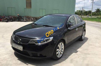 Kia Forte  AT 2011 - Bán ô tô Kia Forte AT năm sản xuất 2011, màu đen đã đi 65000 km, giá 445tr