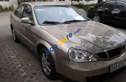 Daewoo Magnus 2.0 2004 - Bán Daewoo Magnus 2.0 năm 2004, màu nâu số sàn