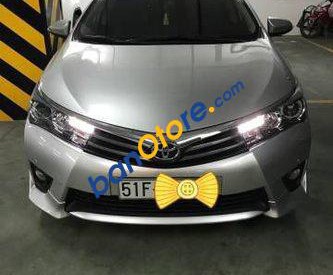 Toyota Corolla altis   AT 2015 - Cần bán xe Toyota Corolla altis AT sản xuất năm 2015, màu bạc đã đi 15000 km