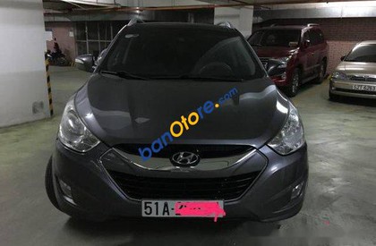 Hyundai Tucson AT 2011 - Cần bán lại xe Hyundai Tucson AT năm sản xuất 2011, màu đen, đã đi 60000 km