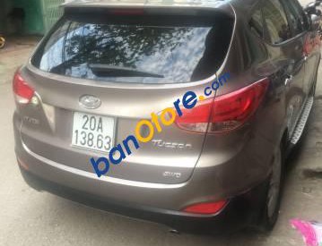 Hyundai Tucson 2012 - Bán ô tô Hyundai Tucson sản xuất năm 2012, màu nâu