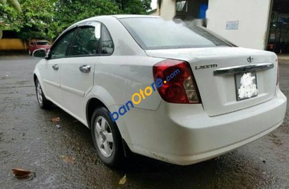 Daewoo Lacetti  MT 2004 - Cần bán gấp Daewoo Lacetti MT năm sản xuất 2004, màu trắng, giá 180tr