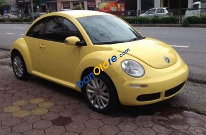 Volkswagen Beetle  2.0AT 2009 - Cần bán lại xe Volkswagen Beetle 2.0AT sản xuất năm 2009, màu vàng, nhập khẩu nguyên chiếc, giá 618tr