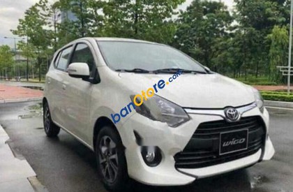 Toyota FJ   1.2 MT  2018 - Bán Toyota Wigo 1.2 MT sản xuất năm 2018, màu trắng, xe nhập