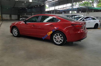 Mazda 6 2.0L 2014 - Cần bán lại xe Mazda 6 2.0L sản xuất 2014, màu đỏ, 750tr