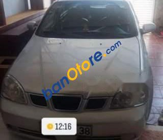 Daewoo Lacetti EX 2004 - Cần bán xe Daewoo Lacetti EX sản xuất năm 2004, màu bạc