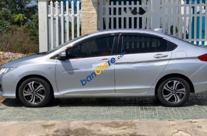 Honda City 1.5MT   2014 - Bán ô tô Honda City 1.5MT năm 2014, màu bạc xe gia đình