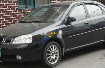 Daewoo Lacetti 2004 - Cần bán gấp Daewoo Lacetti sản xuất năm 2004, màu đen, xe nhập