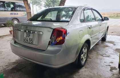 Daewoo Lacetti 2009 - Cần bán xe Daewoo Lacetti sản xuất 2009, màu bạc