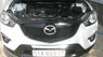 Mazda CX 5 2014 - Bán xe Mazda CX5 2WD AT 2014 trắng. 680 triệu 