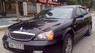 Daewoo Magnus 2.5 L6 2004 - Cần bán xe Daewoo Magnus 2.5 L6 đời 2004, màu đen số tự động, giá chỉ 200 triệu