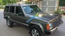 Jeep Cherokee GL 1990 - Cần bán gấp Jeep Cherokee GL 1990, màu xám, nhập khẩu chính hãng