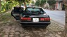 Toyota Corolla 1990 - Cần bán gấp Toyota Corolla đời 1990, màu đen, xe nhập, giá 100tr